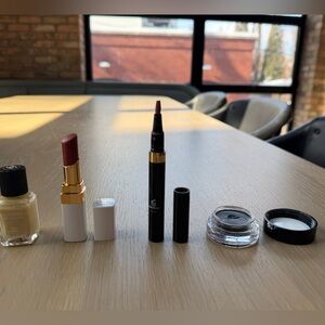 X4 Chanel items: nail polish “beige” lip color, concealer, potted eye liner.